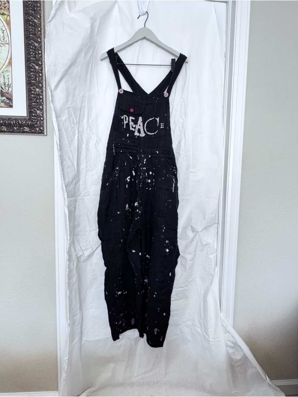 Magnolia Pearl Black Overalls with 'PEACE' Graphic and White Paint Splatter